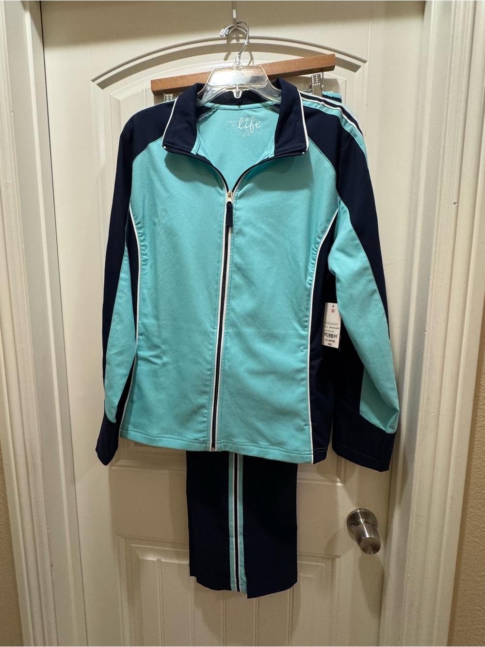 Made for Life Ladies Aqua and Navy Zip-Front (XL) Jacket and (L) Pant set.